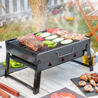 Klappbarer tragbarer Grill für die Verwendung mit Holzkohle BearBQ InnovaGoods